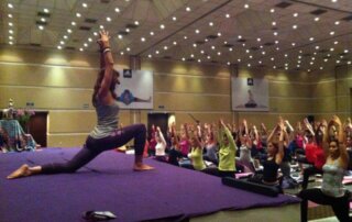 Brigitte Longueville teaching at the 9th national yoga conference with the Back Mitra